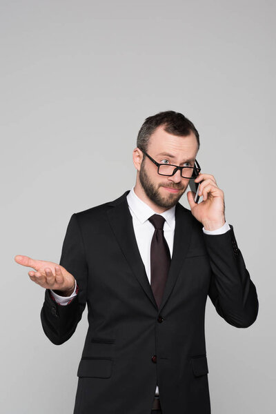 Young businessman talking on phone 