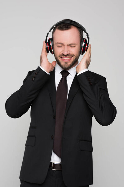 Businessman listening to music  