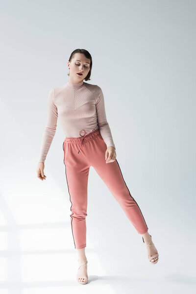 thoughtful woman in retro clothing