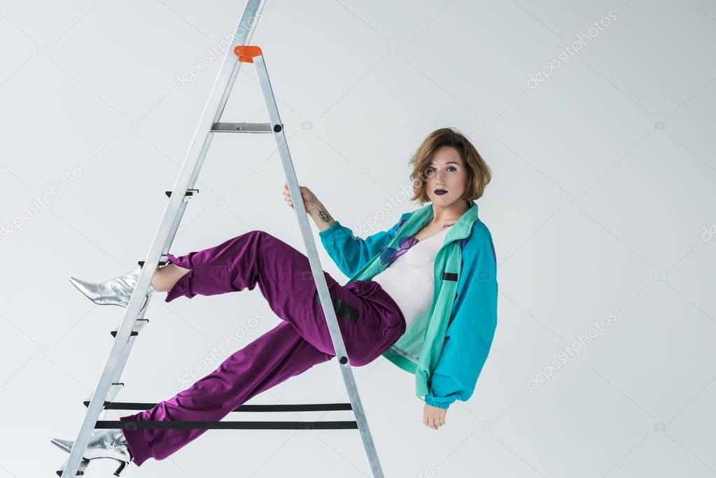 woman in vintage suit with ladder