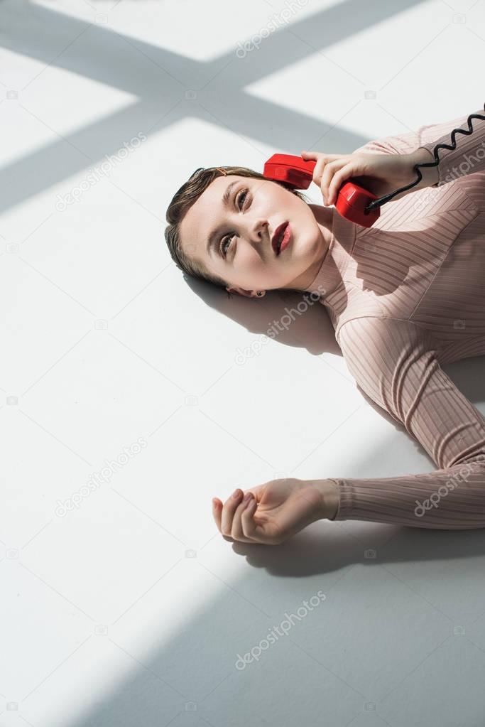 girl with vintage phone tube