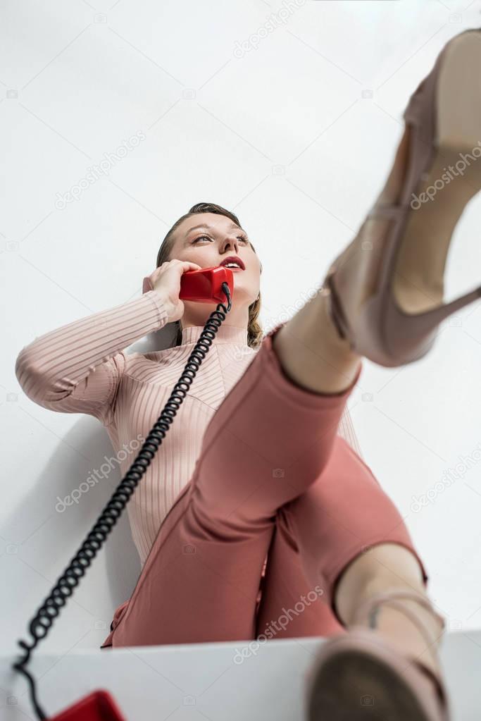 girl with vintage rotary telephone 