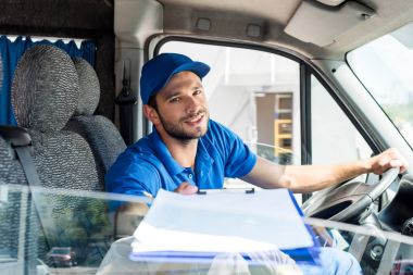 delivery man with clipboard clipart