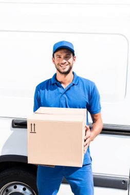 delivery man with box clipart