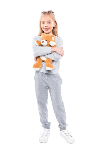 child with teddy bear