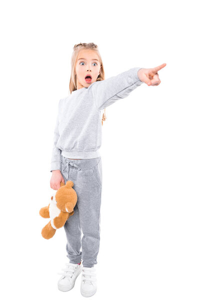 shocked child pointing with finger