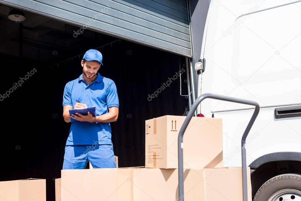 delivery man with clipboard