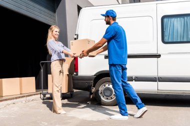 courier giving package to woman clipart