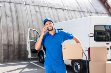 delivery man talking by phone