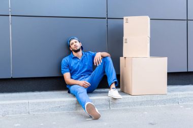 exhausted delivery man clipart