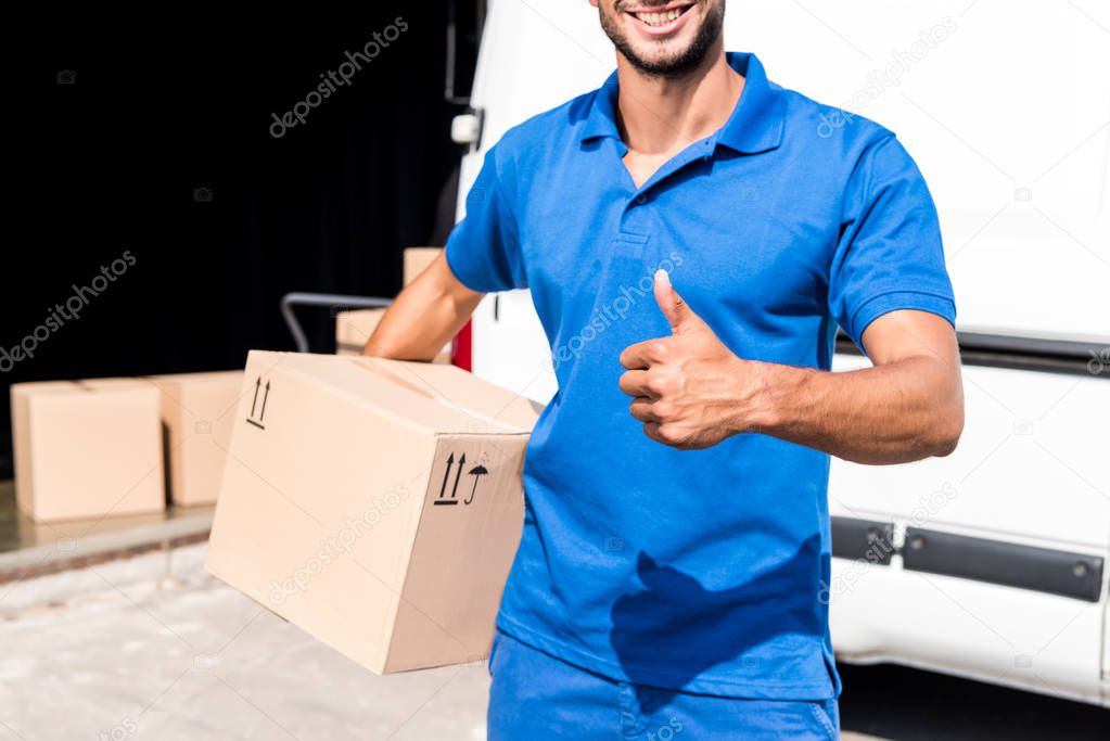 delivery man showing thumb up