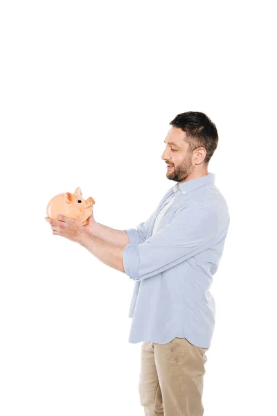 Man holding piggy bank — Free Stock Photo