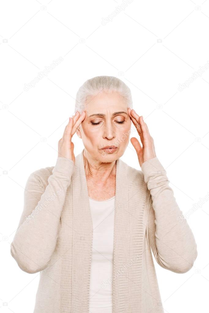 senior woman with headache