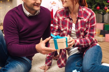 couple with christmas present clipart