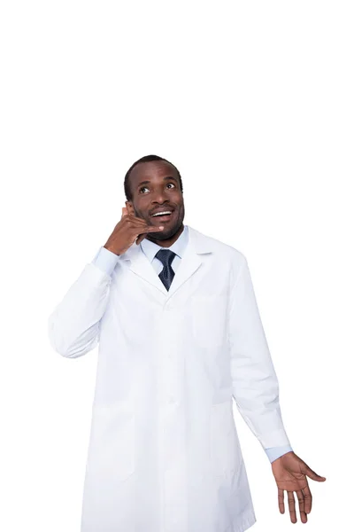 Doctor pretending phone talk with hand — Free Stock Photo