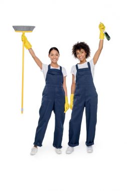 multiethnic cleaners in uniforms clipart