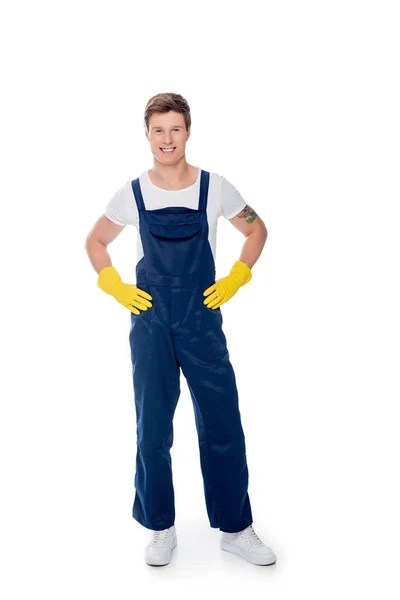 Smiling cleaner standing akimbo — Stock Photo, Image