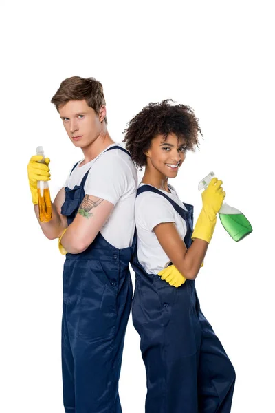 Multiethnic cleaners with cleaning supplies — Stock Photo, Image