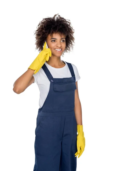 African american cleaner with smartphone — Stock Photo, Image