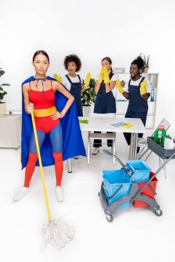 multiethnic group of professional cleaners