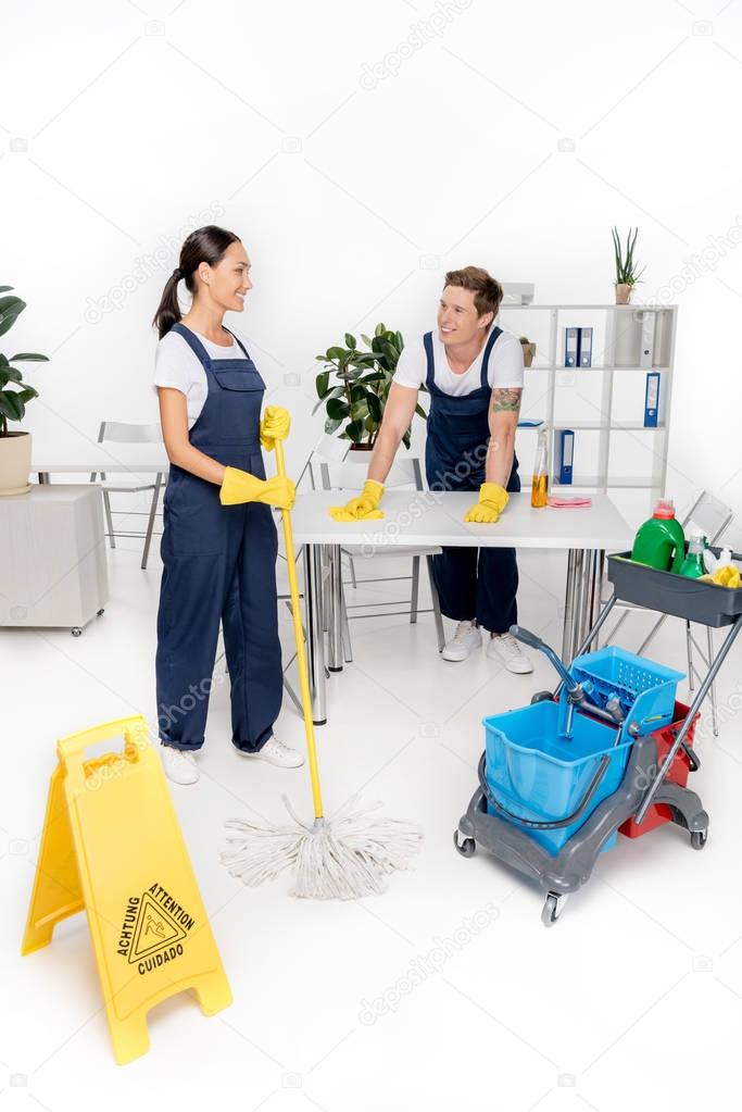 professional young multiethnic cleaners 