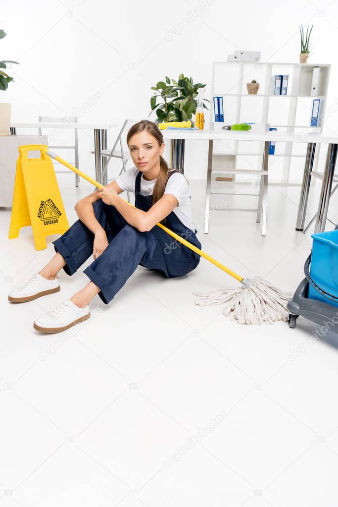 young cleaner with mop