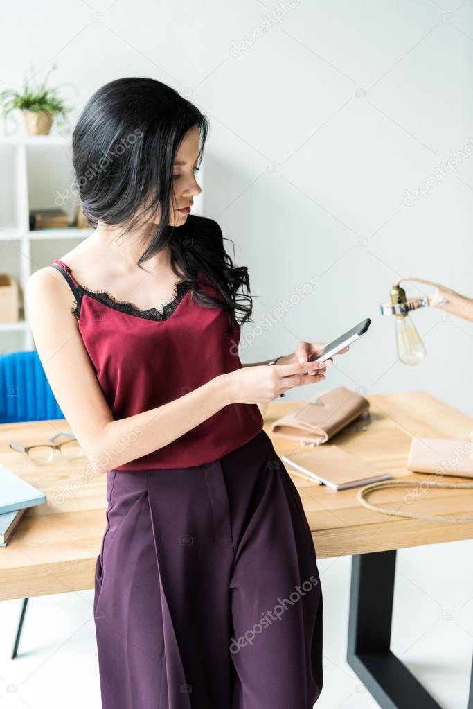 businesswoman using smartphone