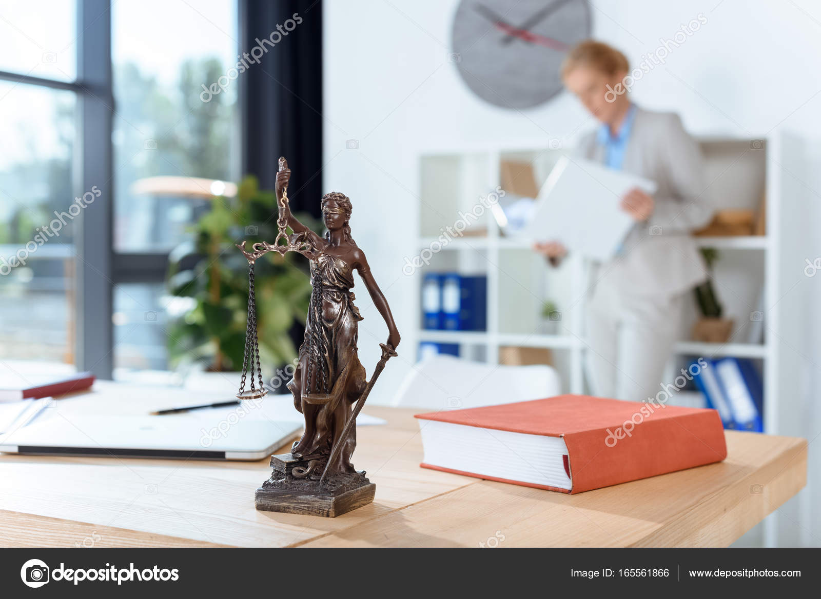 Themis sculpture on table — Stock Photo © IgorVetushko 165561866
