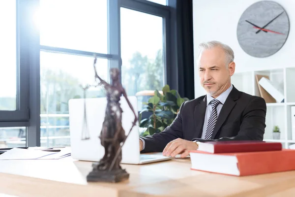 Lawyer working with laptop — Stock Photo, Image