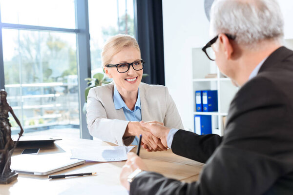 business colleagues shaking hands