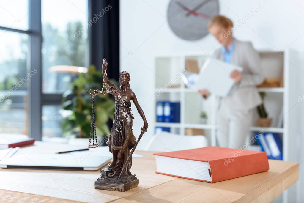 themis sculpture on table