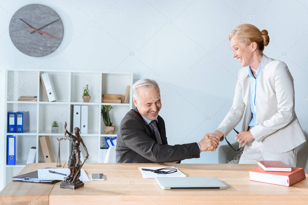 lawyers shaking hands