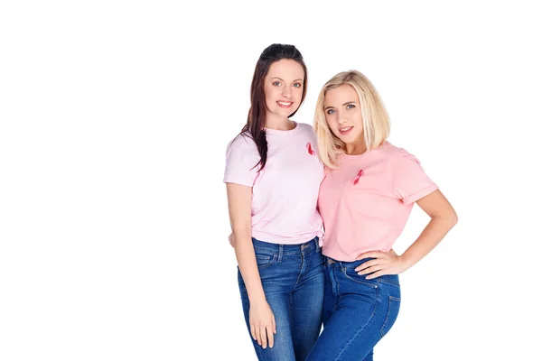 Unga kvinnor i rosa t-shirts — Stockfoto