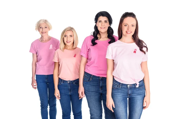 Kvinnor i rosa t-shirts med band — Stockfoto