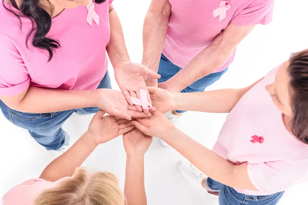 Women holding hands with ribbon — Stock Photo, Image