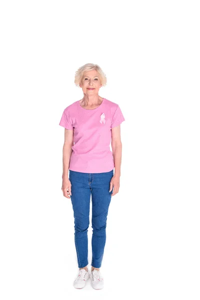 Senior woman in pink t-shirt with ribbon — Stock Photo, Image