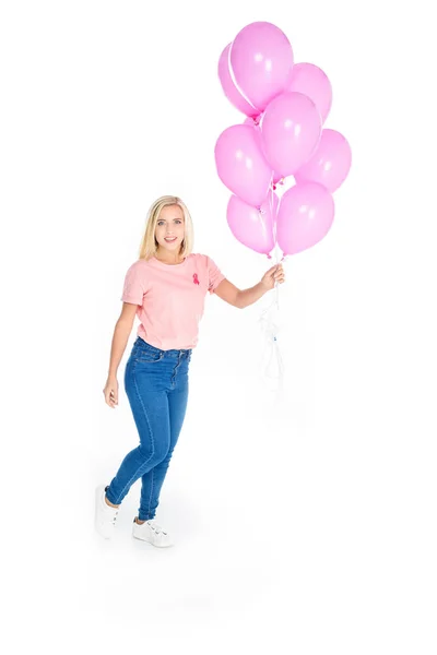 Jovem mulher com balões rosa — Fotografia de Stock