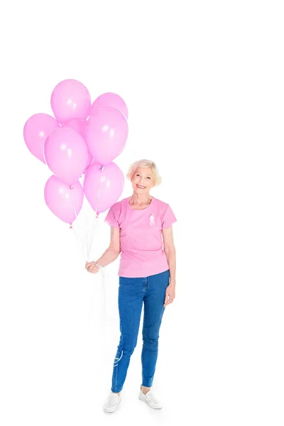 Pembe balonlu kadın kıdemli — Stok fotoğraf