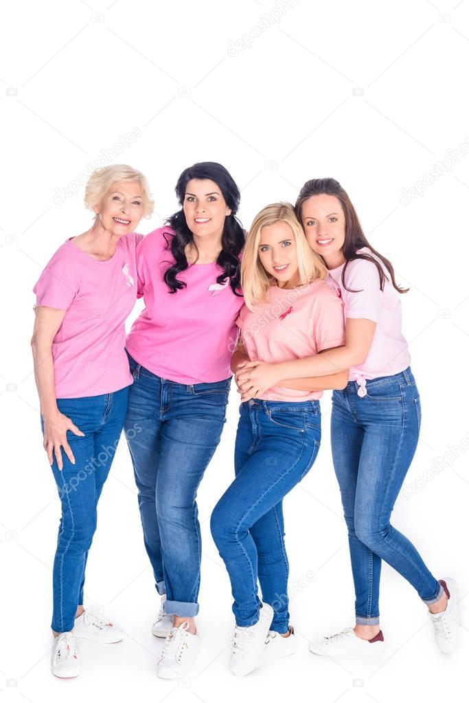 women in pink t-shirts with ribbons