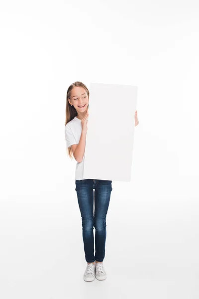 Youngster holding empty board — Stock Photo, Image