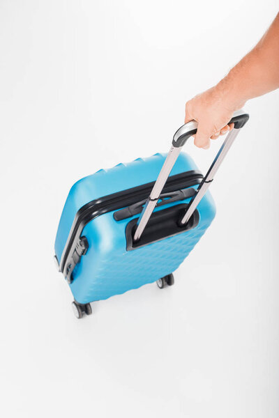 hand holding luggage bag