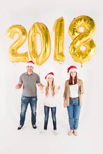 Família com balões de Ano Novo — Fotografia de Stock