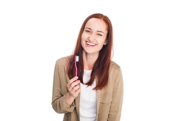 Жінка з зубною щіткою — стокове фото