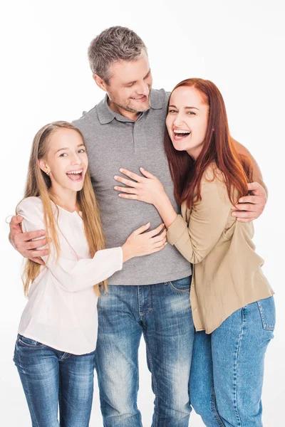 Familia emocionada abrazándose juntos —  Fotos de Stock