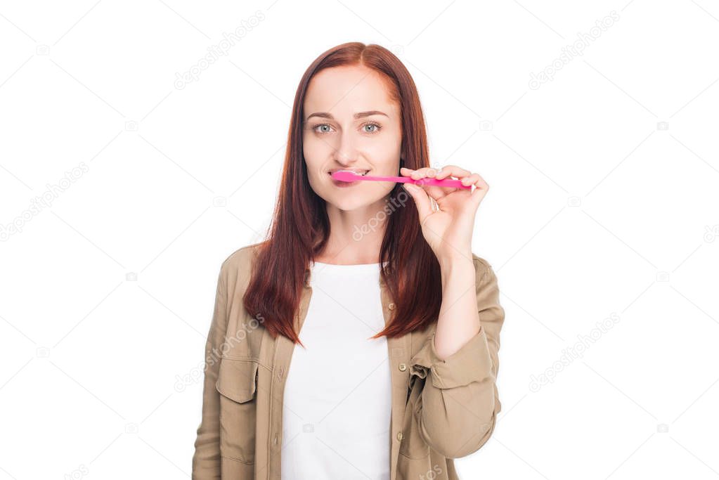 woman brushing teeth 