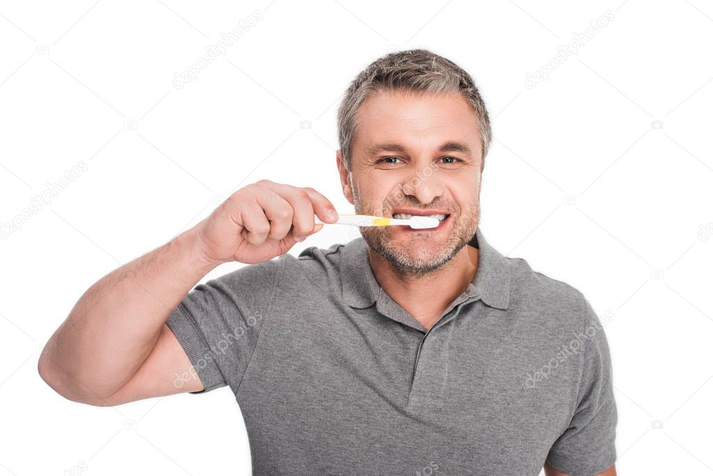 man brushing teeth 