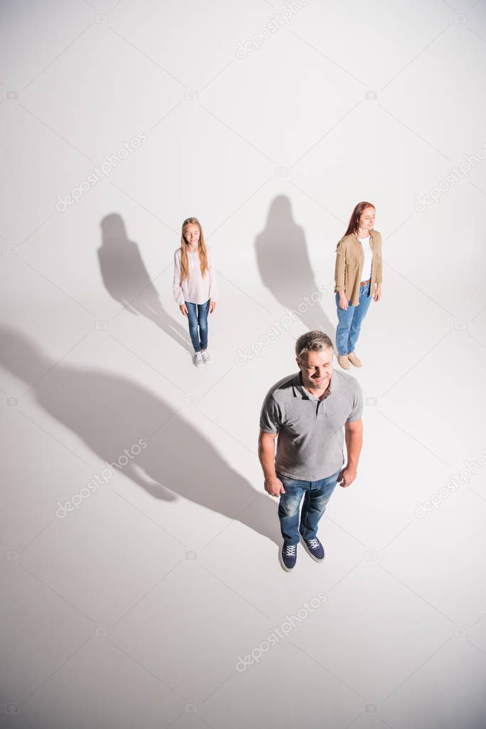 young family with shadows