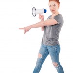 Shocked  woman holding megaphone