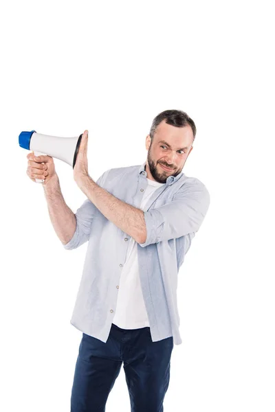 Grimace caucasian man with loudspeaker — Free Stock Photo