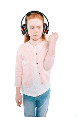 child listening music with headphones clipart